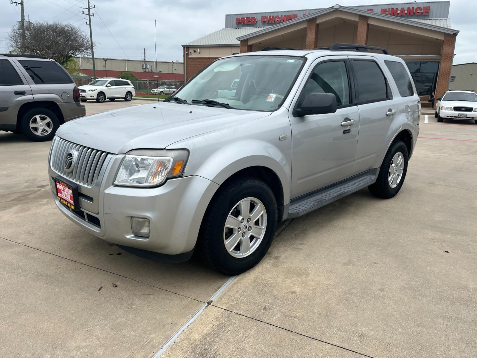 2009 SILVER /gray Mercury Mariner V6 2WD (4M2CU81G49K) with an 3.0L V6 engine, 6-Speed Automatic transmission, located at 14700 Tomball Parkway 249, Houston, TX, 77086, (281) 444-2200, 29.928619, -95.504074 - Photo #2